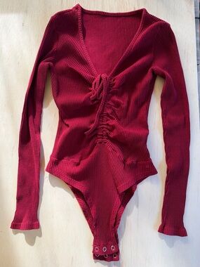 Ribbed Long-Sleeve Body Suit in Deep Wine Red